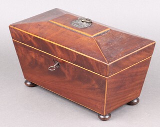 A Georgian inlaid mahogany twin compartment tea caddy of sarcophagus form with hinged lid, on bun feet 15cm h x 27cm w x 13cm d 