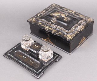A Victorian black papier mache and inlaid mother of pearl sewing box with hinged lid and fitted interior, 9cm h x 26cm w x 20cm d, together with a chinoiserie style 2 bottle ink stand fitted 2 glass inkwells, stamp box to centre and pen recess on bracket feet 6cm h x 21cm w x 15cm d 