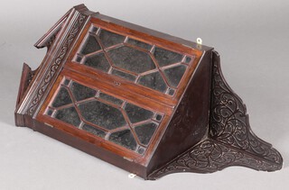 An Edwardian Georgian style mahogany corner cabinet with fretted broken pediment, fitted a shelf enclosed by astragal glazed panelled doors 92cm h x 37cm w x 53cm d 