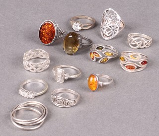Thirteen various silver and other dress rings 