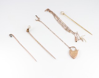 A 9ct gold belcher link chain (a/f), a 9ct gold padlock clasp, 3.2 grams and 2 stick pins 
