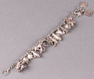 A white metal curb link chain hung numerous charms 19cm 