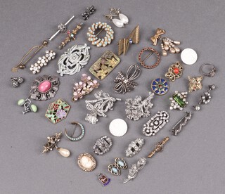 A collection of silver filigree and diamonte bar brooches 
