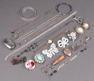 A cloisonne enamel bangle, a silver plated vesta case, 3 paste set dress rings, a gilt metal ring set demi-pearls and a blue stone, a gilt chain, brooches and other items of costume jewellery 