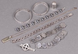 A 925 silver ingot pendant, a niello bracelet, 2 bracelets formed from coins, silver thimble, 2 child's engraved bracelets etc  