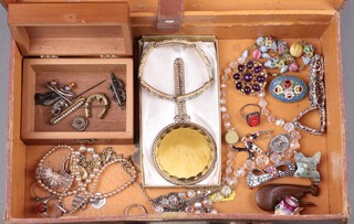A small leather attache case containing a micro mosaic brooch and bracelet and a small quantity of costume jewellery 