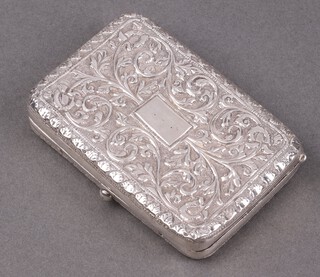 An Eastern rectangular embossed white metal cigarette case with hinged lid 9cm x 5.5cm 