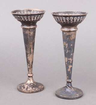 A pair of pierced silver specimen vases of waisted form, Birmingham 1918, 19cm 