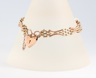 A 9ct 2 colour gold bracelet with padlock clasp, 17cm, 8.2g