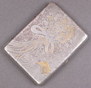 A Japanese metal cigarette case with floral pattern and tiger to the front, the interior with "volcano" mark 