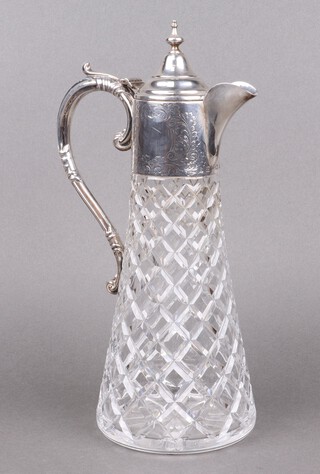 A Victorian style waisted cut glass claret ewer with engraved silver mount, Birmingham 1972, makers marks rubbed 