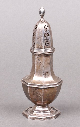 A Georgian style octagonal silver sugar caster, Birmingham 1916, marks rubbed, 60g 