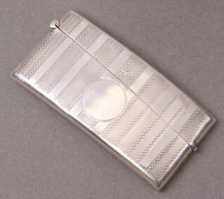 A silver card case with engine turned decoration, Birmingham 1914, 44g 
