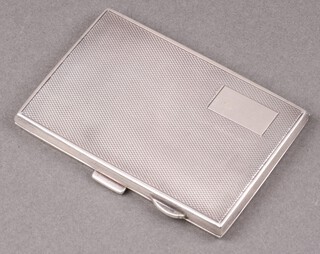 A lady's Art Deco silver cigarette case with engine turned decoration, Chester 1931, 61g 