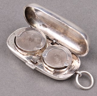 An Edwardian oval silver double sovereign case Birmingham 1905 by Horace Woodward & Co., 31g