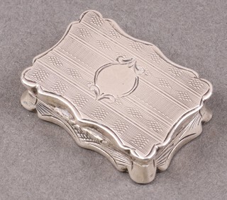 A Victorian rectangular engraved silver vinaigrette with silver gilt grill, Birmingham 1856 by Alfred Taylor, 10g 
