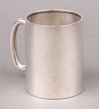A silver christening tankard, Birmingham 1922, engraved PSB, marks rubbed 79g