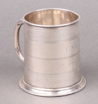 A silver christening tankard monogrammed DNM dated 3.9.31, Birmingham 1931, 59g 