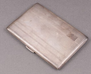 A silver cigarette case with engine turned decoration Birmingham 1960, 185g