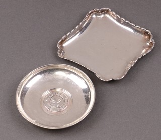 A square silver pin tray London 1927, 8cm, a circular silver dish Birmingham 1926 marked Alsatian League, 64g 