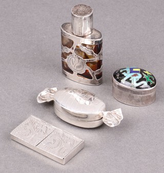 A rectangular Continental engraved silver twin section stamp box with import marks 1997, a 925 sweet shaped trinket box, a scent bottle with metal mount 