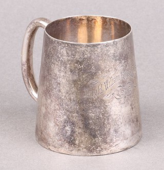 A marked silver christening tankard of waisted form, engraved, 85g