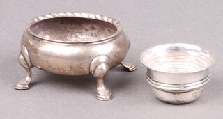 A circular silver salt Birmingham 1945 (dent to base), a Georgian oval silver salt (marks illegible) 103g 