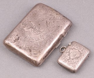 An Edwardian engraved silver vesta case Birmingham 1901, an engraved silver cigarette case Birmingham 1916, monogrammed (possibly patched, dented) 93g 