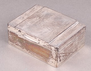An Art Deco silver cigarette box with hinged lid 5cm x 11cm x 8cm, (marks rubbed), a rectangular St Christopher medal marked silver 