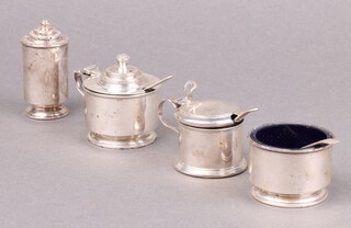 A 3 piece silver condiment set with mustard, salt and pepper, with blue glass liners, London 1936, a silver mustard pot with blue glass liner Birmingham 1932, 3 silver Old English pattern salt spoons, 162g  