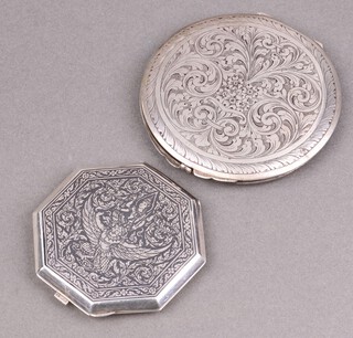 A Siamese octagonal silver compact with niello decoration and an 800 engraved silver compact, 144g gross 