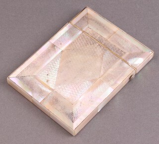 A Victorian carved mother of pearl card case 10cm x 8cm