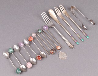 An Edwardian silver fork Sheffield 1902, a pair of silver sugar tongs Birmingham 1904 and a silver medical identity disk and 6 Eastern teaspoons with polished hardstone terminals, 5 ditto cocktail sticks, etc 