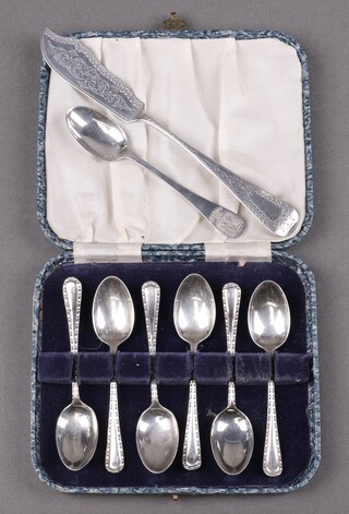 A set of 6 silver monogrammed coffee spoons Sheffield 1946, a silver teaspoon decorated Arms of Kingston Sheffield 1912 and a Victorian engraved silver butter knife London 1892, 106 