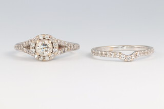An 18ct white gold diamond cluster ring size M, together with an ensuite 18ct white gold and diamond set wedding band, size M, gross weight 6g