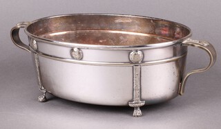 Viners, an oval silver plated Gothic Revival twin handled bowl with roundel decoration, raised on paw supports 10cm h x 29cm x 17cm d 