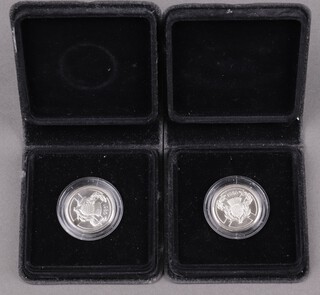 A pair of 1986 Scottish Commonwealth Games two pound coins, cased 