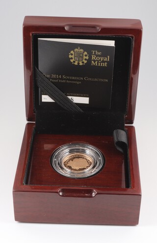 A gold half sovereign 2014, cased and with certificate of authenticity 