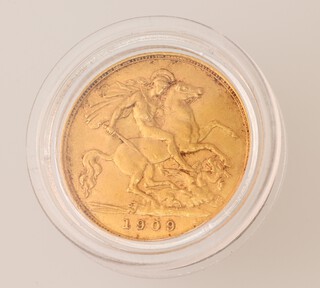 A gold half sovereign 1909