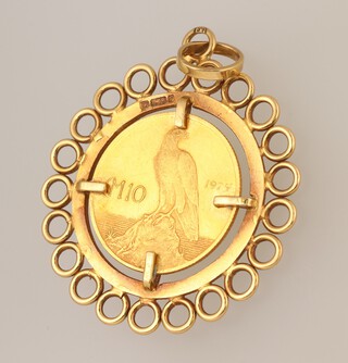A Maltese ten pound coin 2.7g within a gold pendant mount 7.4g gross