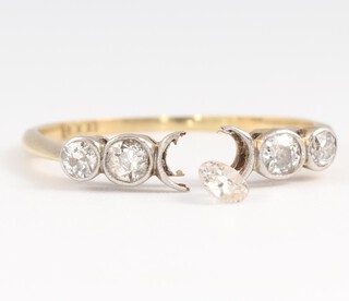 An 18ct 5 stone diamond ring (a/f - one stone is loose, the ring is split), 1.4 grams gross 