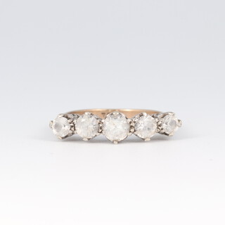 A gold and paste set ring marked 9ct, size N, 3g