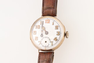 A gentleman's 1920's wristwatch with enamelled dial Arabic numerals contained in a 9ct gold case with unsigned movement, case no.410342 SOR, 28g gross 
