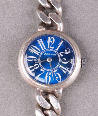 A lady's Zephir wristwatch with blue dial and Arabic numerals, the movement marked 17 jewels, contained in a silver case with curb link bracelet, 46g gross