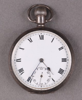 An open faced pocket watch with enamelled dial, Roman numerals and subsidiary second hand, the movement marked Warranted English no.318998, contained in a silver case marked Dennison Watch Case, Birmingham 1919 