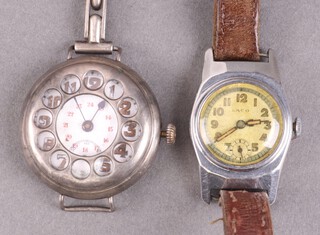 A lady's Continental wristwatch with enamelled dial, Arabic numerals, 24 hour clock numerals, contained in a Continental white metal case no.6366 together with a lady's Laco wristwatch movement no.526 in a stainless steel case on a leather strap 