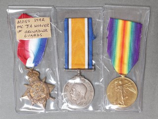 A group of 3 medals comprising 1914 Star (no bar), British War medal and Victory medal  to 16115 Private A J Weaver Grenadier Guards 
