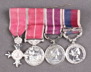 A group of 4 miniature medals comprising Military Issue MBE, Military Issue BEM, Meritorious Service Medal, RAF Long Service Good Conduct medal and bar, mounted for wear 