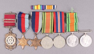 A group of 3 Second World War medals comprising 1939-45 Star, Defence and War medal, mounted for wear, together with a 1939-45 Star, a Defence and British War medal and a gilt metal Royal Arch Principals jewel 