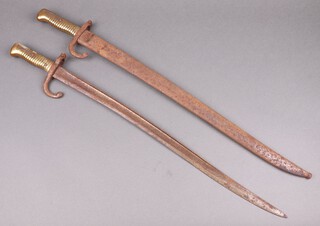 A French chassepot bayonet with scabbard (heavily rusted), the scabbard marked 1994 H and 1 other (no scabbard) 